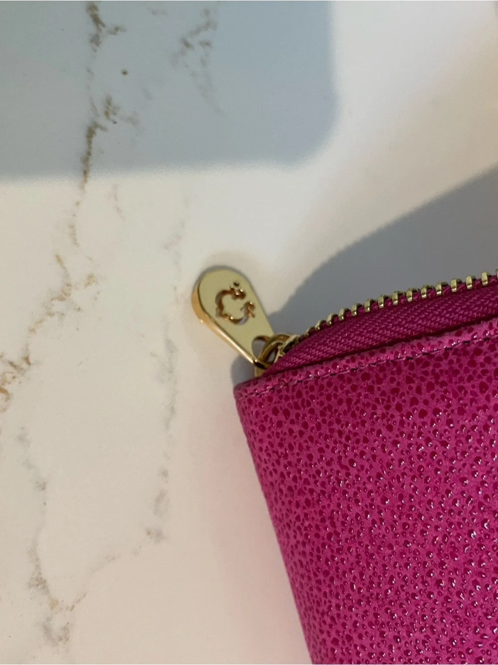 C. Wonder Fuchsia Zip-Around Wallet with Gold Logo